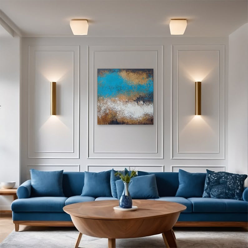 Diezelfde muur, nu met een handgeschilderd werk van Kunst voor iedereen erboven de zetel